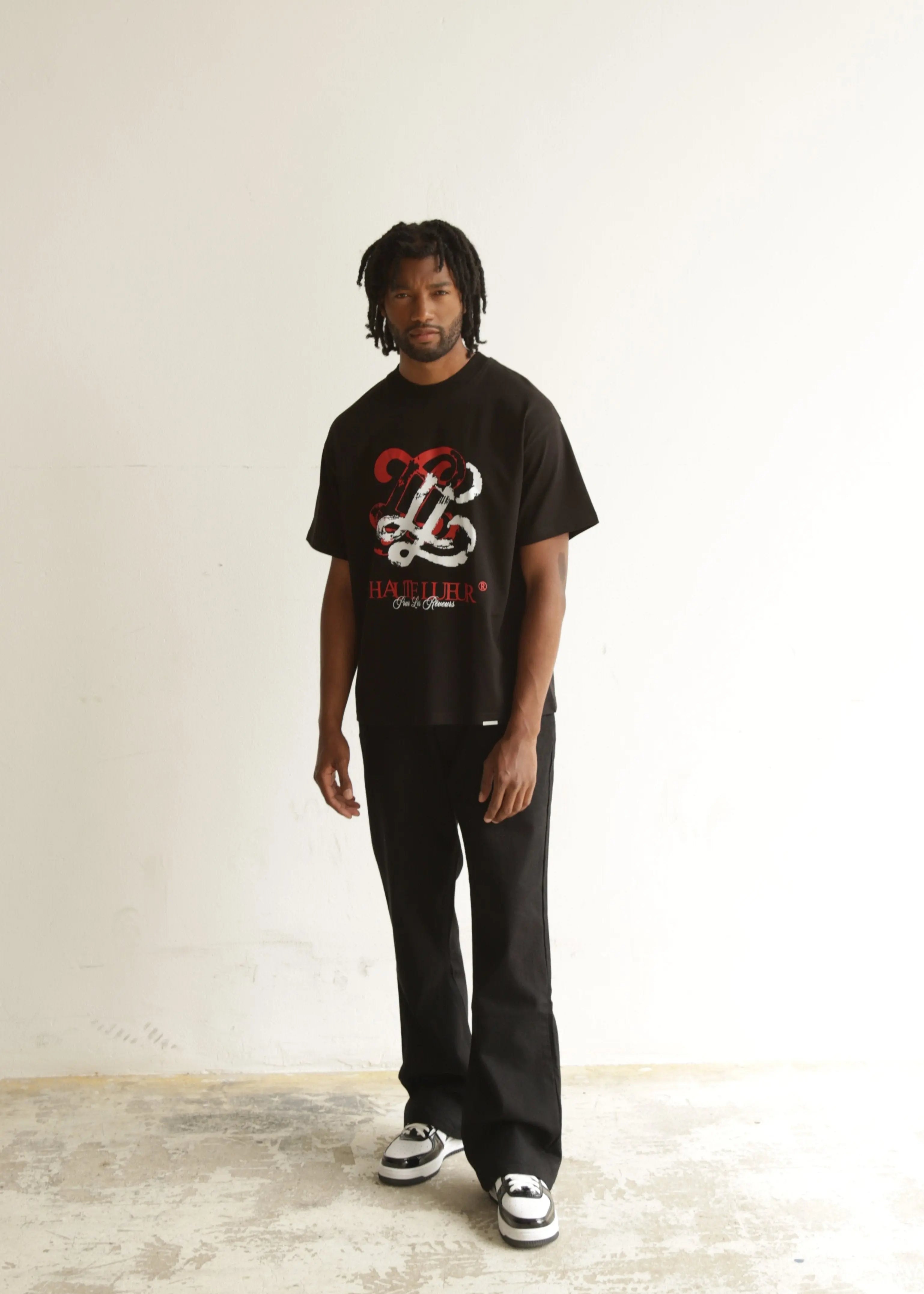 Distressed monogram t-shirt Lueur Clothing